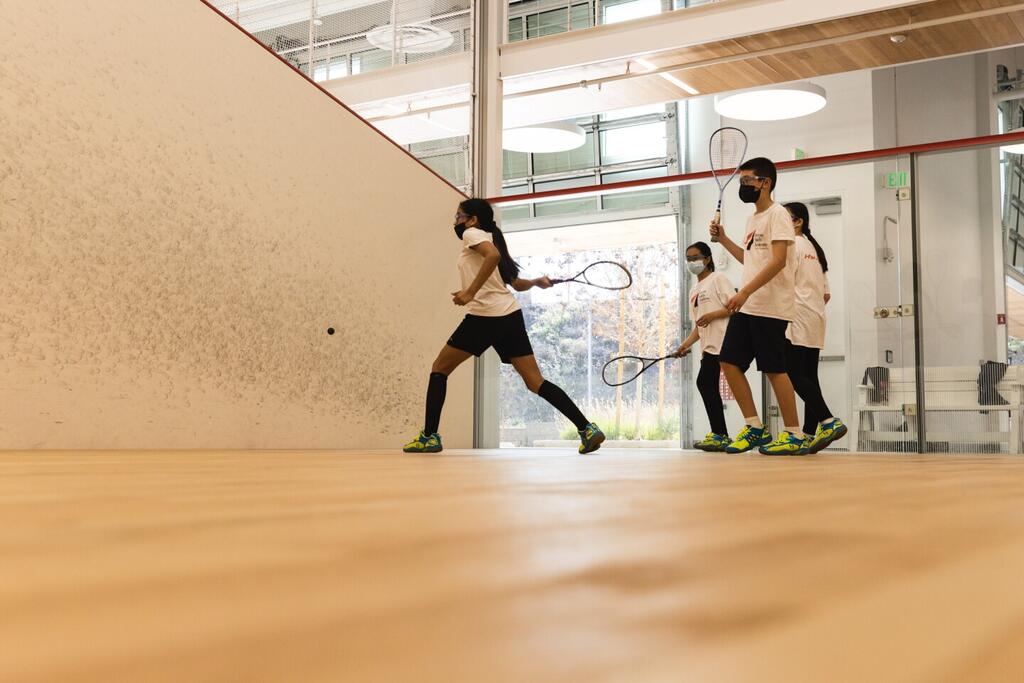 More students at squash practice