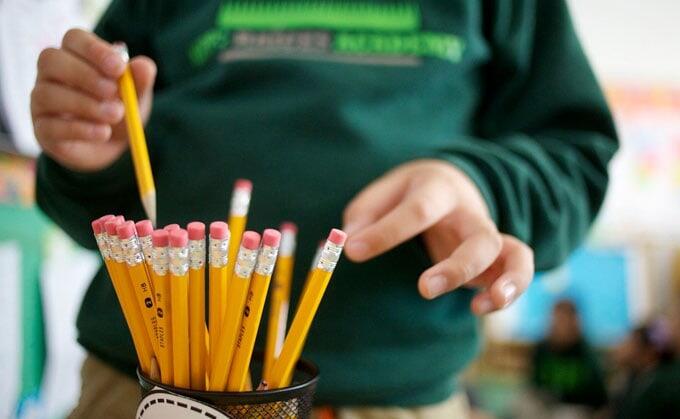 Student selecting a pencil
